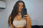 Tara Sutaria poses for bold mirror selfie in white tube bralette, shorts